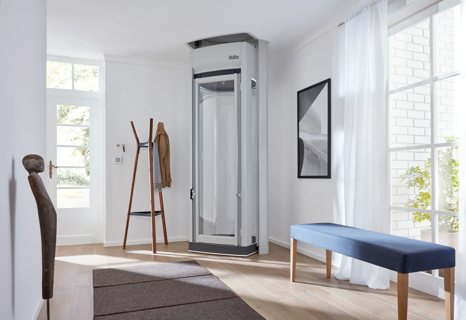 Savaria Vuelift panoramic glass elevator installed in an elegant NJ home, showing the crystal-clear panels and modern design